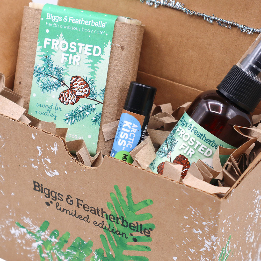 Closeup photo of the products in the Frosted Fir Custom Gift Box by Biggs & Featherbelle®